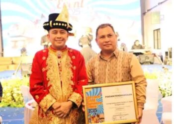 PJ Bupati Dairi Bersama Kepala Dinas Pariwisata Pemuda Dan Olah Raga Dairi Menghadiri Launching Calender Of Events Di Provinsi Sumut