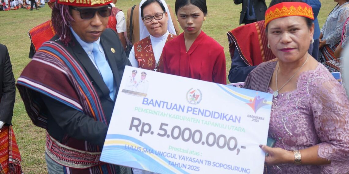 Bupati Taput Pimpin Upacara Hardiknas 2025 di Garoga, Tegaskan Komitmen Pemerataan Pendidikan